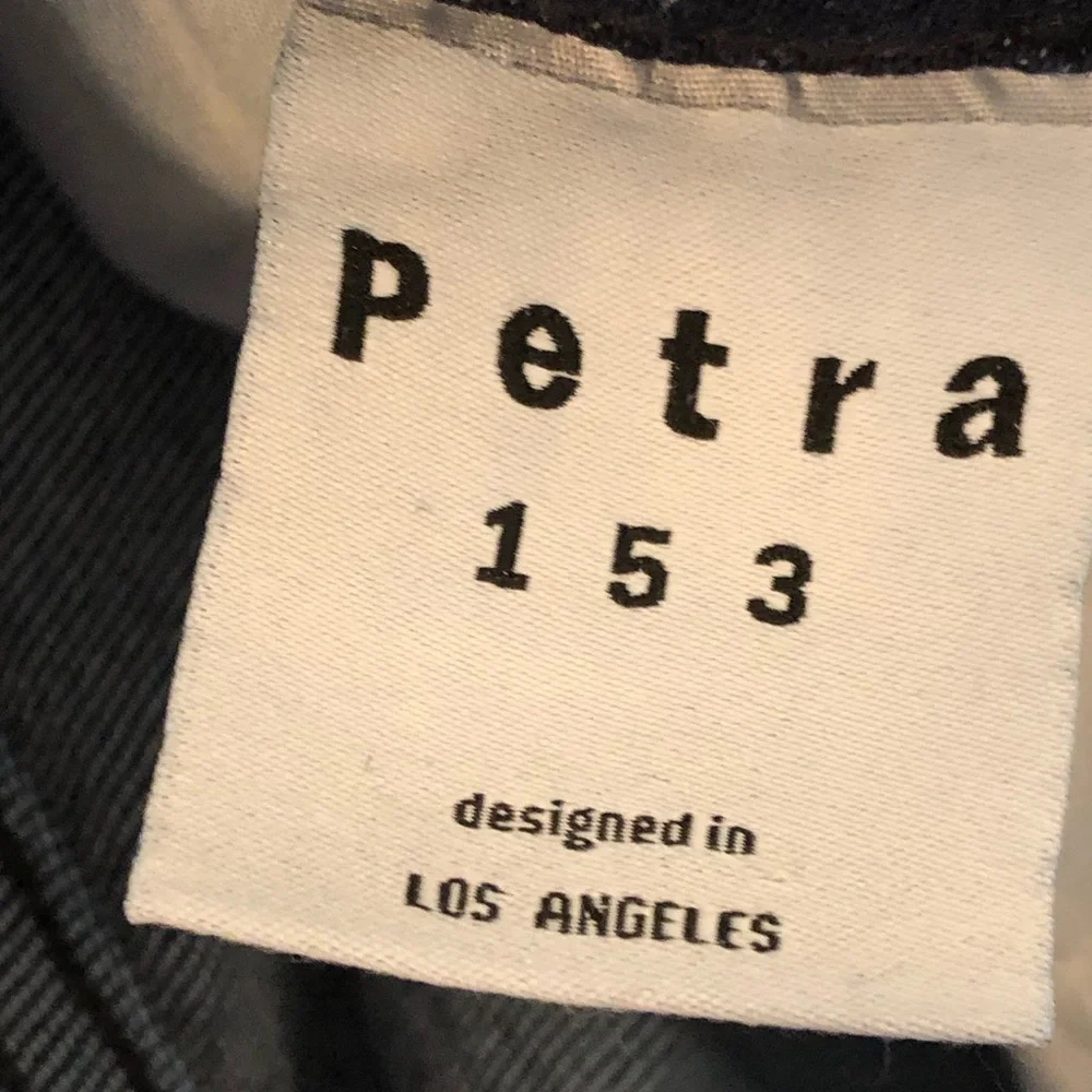 Petra 153 distressed classic boot cut jeans. Size waist 32.